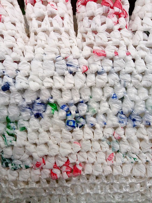 Crochet mat of plastic yarn