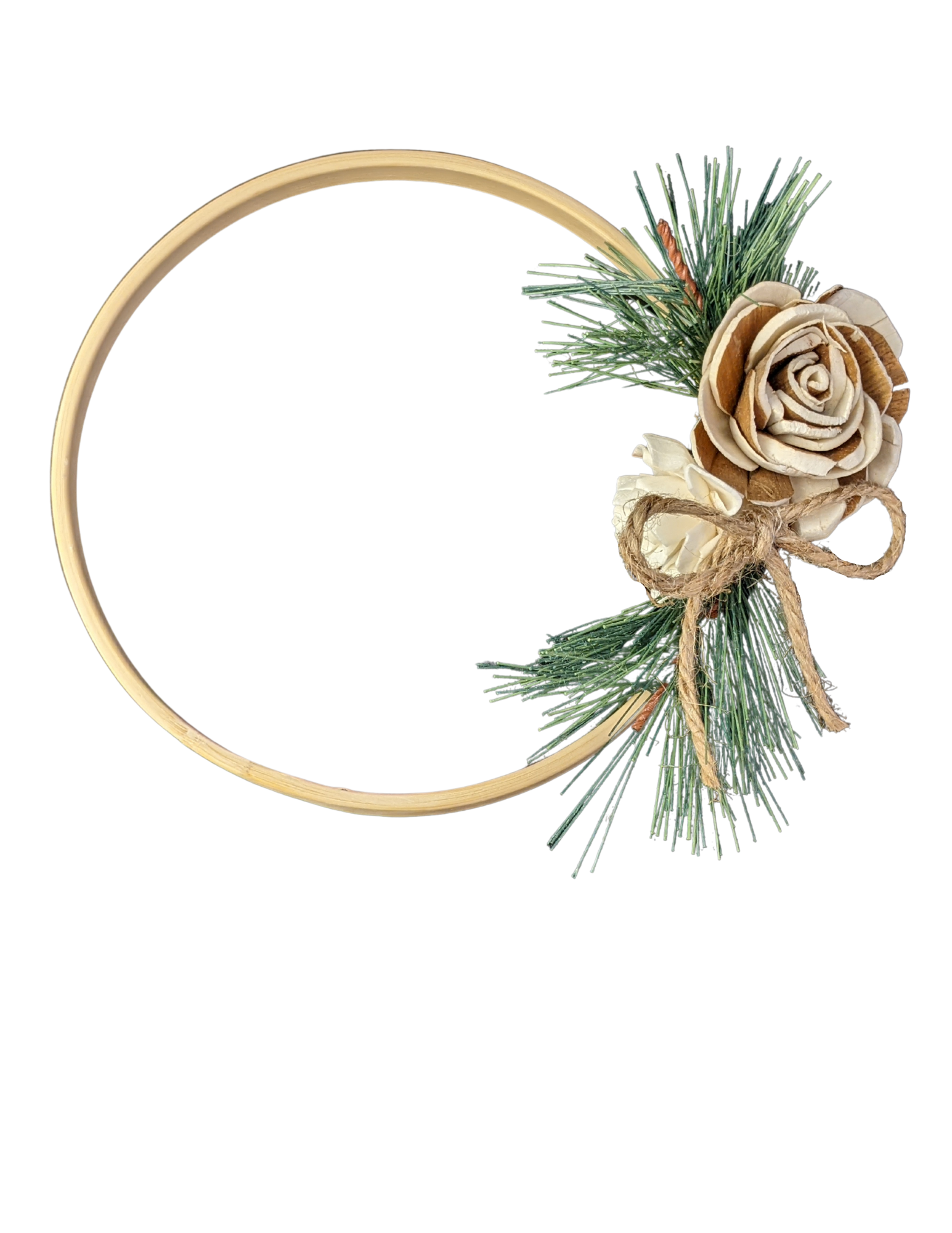 Wooden hoop with faux pine needles and sola wood flower on one side with a twine bow.