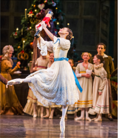 Still image from Nutcracker ballet featuring Claire and the nutcracker on stage.