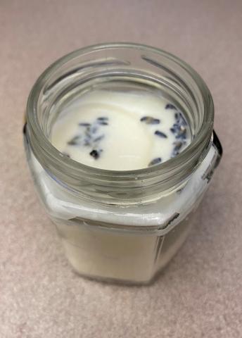 Image of small candle with dried lavender.